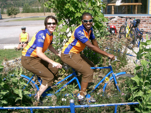 Jess and Kronda in matching jerseys on a tandem bike