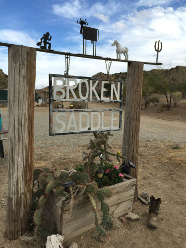 Broken Saddle Riding Tours sign